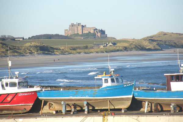 A telephoto seems to bring Bamburgh closer to Seahouses.