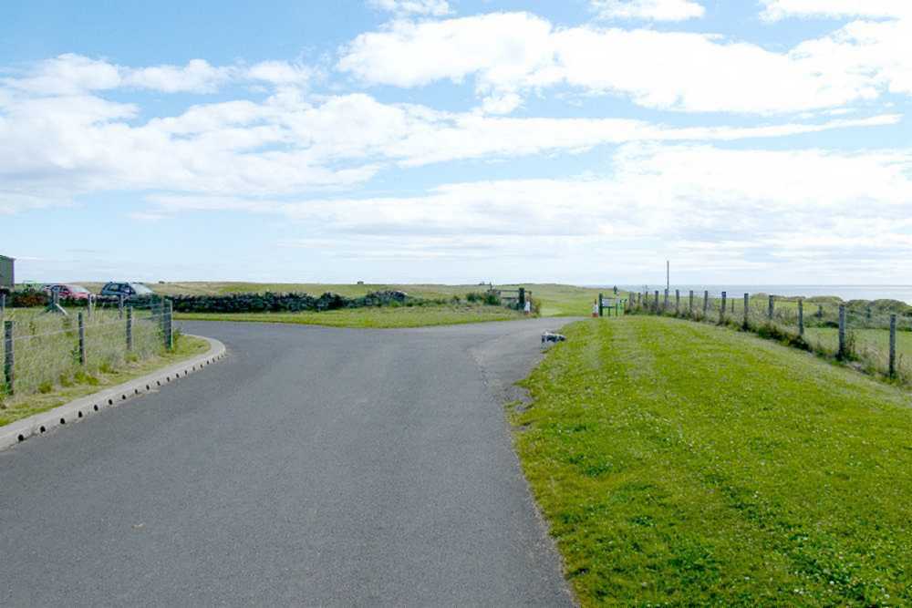 Private road to golf course and water company.